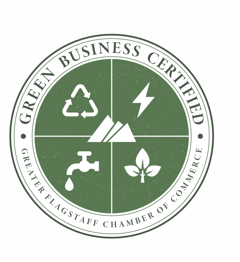 A green and white circular badge labeled "Green Business Certified" from the Greater Flagstaff Chamber of Commerce, featuring icons of recycling, mountains, a lightning bolt, a faucet, and a leaf.