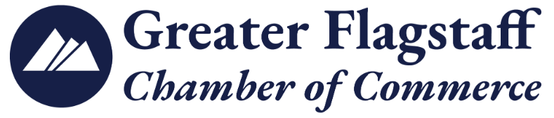 Logo for the Greater Flagstaff Chamber of Commerce, featuring a blue circle with three white mountain peaks on the left and the organization’s name in blue text on the right.